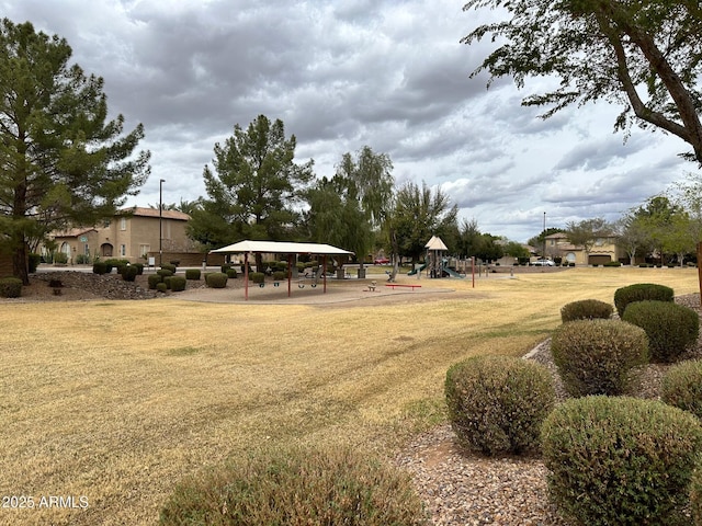 view of yard featuring a gazebo and playground community