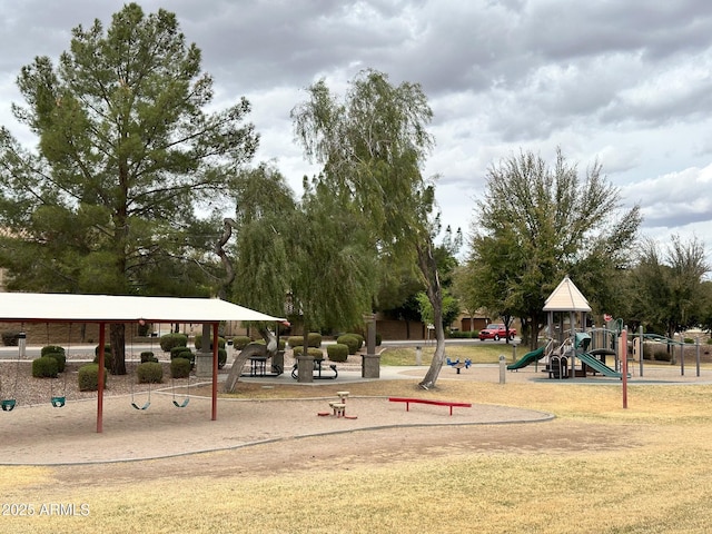 view of community featuring a lawn and playground community