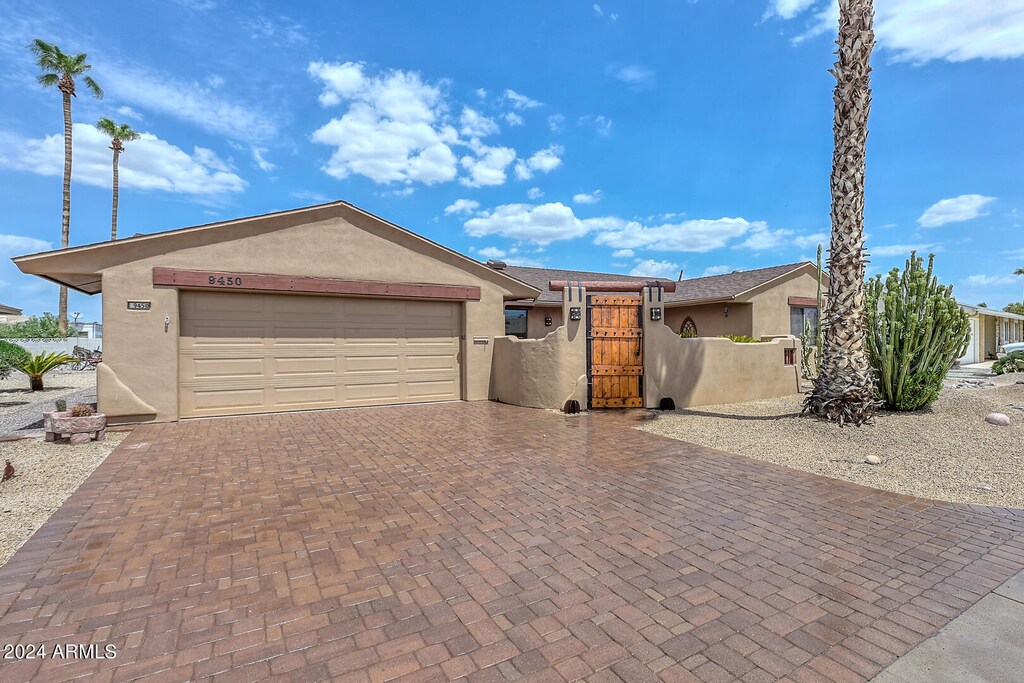 view of front of home with a garage