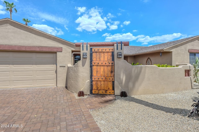 view of front of property featuring a garage