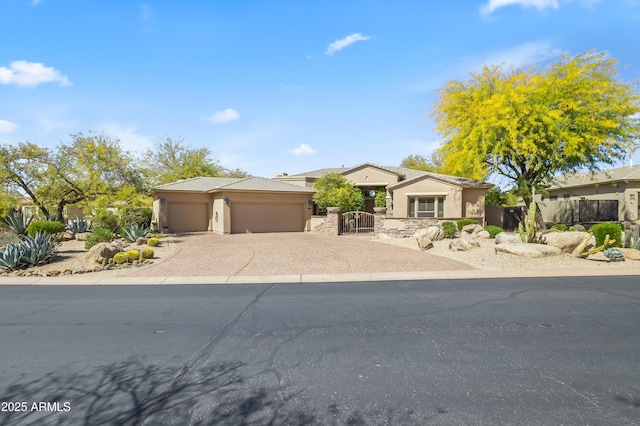 single story home featuring a gate, fence, stucco siding, concrete driveway, and a garage