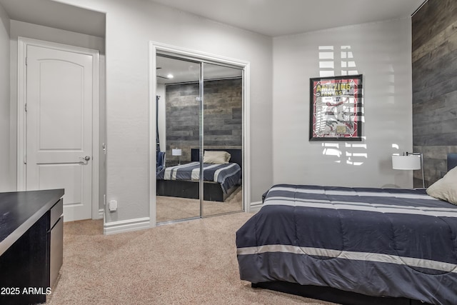 bedroom featuring a closet and baseboards