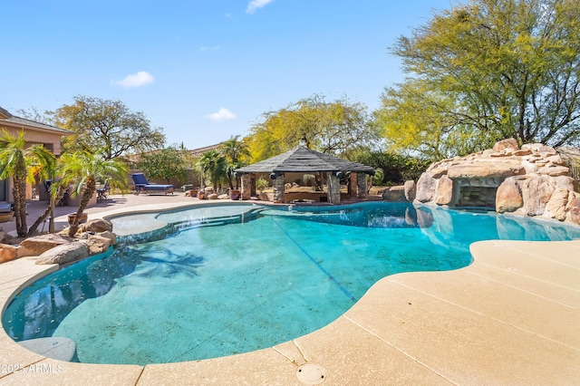 pool featuring a gazebo and a patio