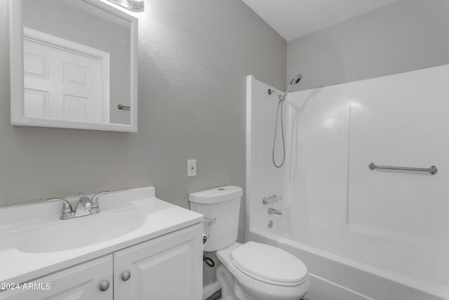 full bathroom with toilet, washtub / shower combination, and vanity