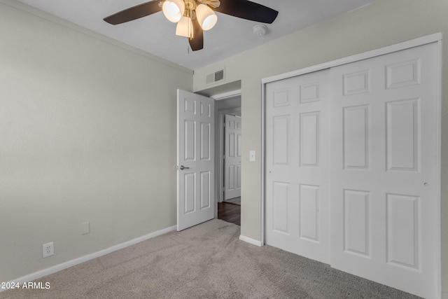 207 E Thomas St, Casa Grande, AZ 85122 - unfurnished bedroom featuring carpet floors, baseboards, a closet, and ceiling fan