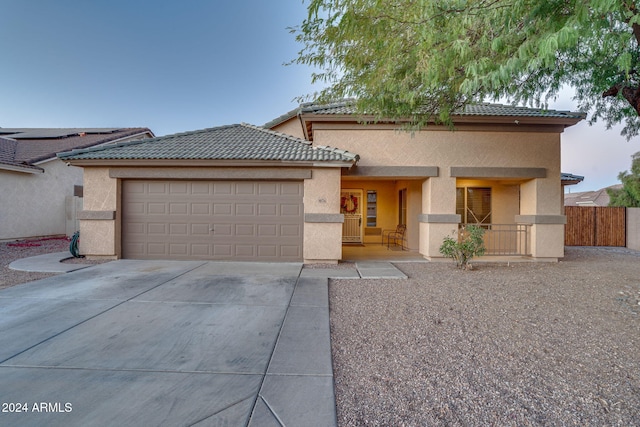 view of front of home with a garage