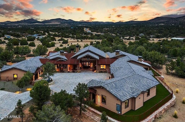 aerial view at dusk with a mountain view