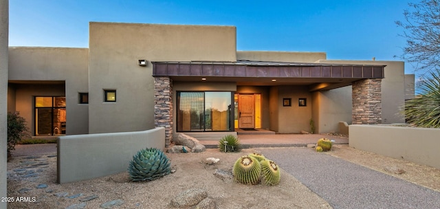 view of adobe home