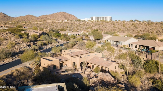 birds eye view of property with a residential view and a mountain view