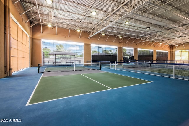 view of sport court with fence