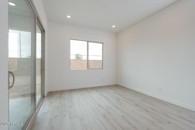 1246 E Penedes Dr, Gilbert, AZ 85298 - spare room with light wood finished floors, baseboards, and recessed lighting