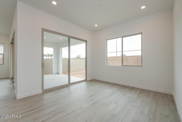 1246 E Penedes Dr, Gilbert, AZ 85298 - spare room featuring light wood finished floors, recessed lighting, and baseboards