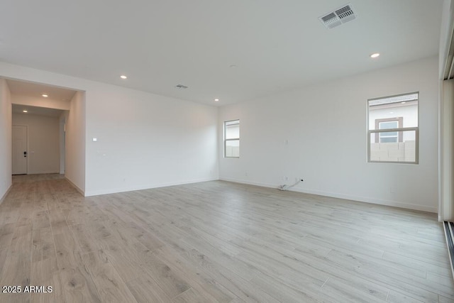 1246 E Penedes Dr, Gilbert, AZ 85298 - spare room with light wood-type flooring, recessed lighting, and baseboards