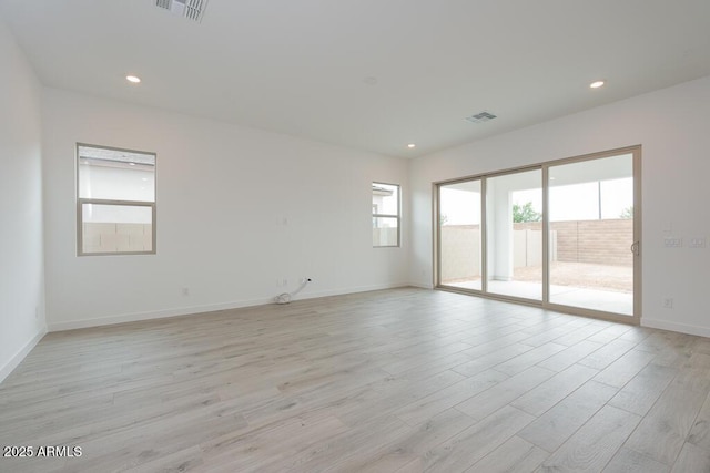 1246 E Penedes Dr, Gilbert, AZ 85298 - spare room with baseboards, light wood finished floors, and recessed lighting