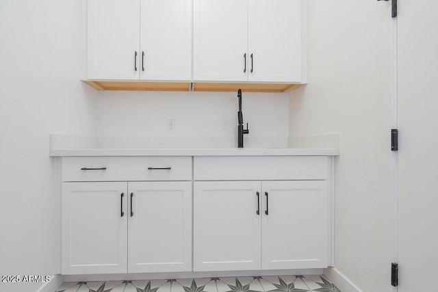1246 E Penedes Dr, Gilbert, AZ 85298 - detailed view of baseboards and a sink