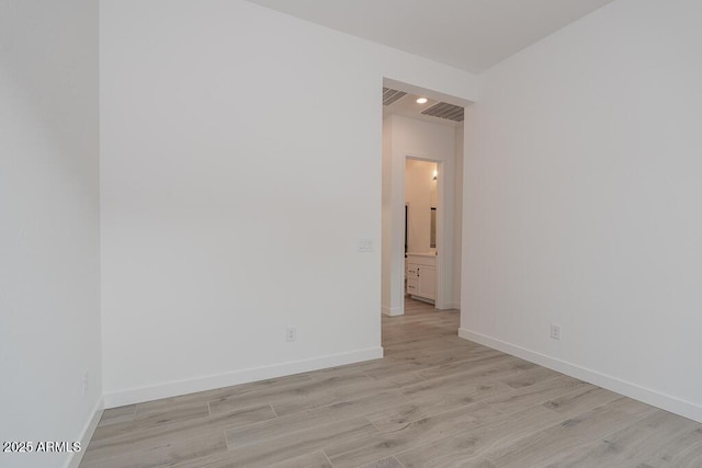 1246 E Penedes Dr, Gilbert, AZ 85298 - empty room featuring light wood-style floors, baseboards, and recessed lighting