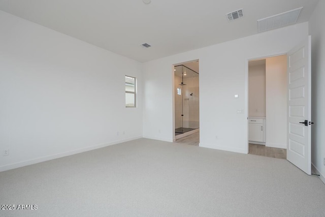 1246 E Penedes Dr, Gilbert, AZ 85298 - unfurnished bedroom with light carpet, baseboards, and ensuite bath
