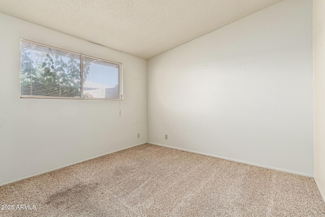 5420 N Granite Reef Rd, Scottsdale, AZ 85250 - carpeted empty room featuring a textured ceiling and baseboards