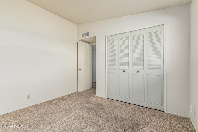 5420 N Granite Reef Rd, Scottsdale, AZ 85250 - unfurnished bedroom featuring carpet floors and a closet