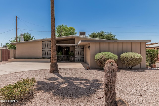 5420 N Granite Reef Rd, Scottsdale, AZ 85250 - mid-century inspired home featuring board and batten siding
