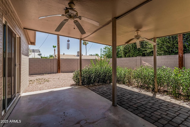 5420 N Granite Reef Rd, Scottsdale, AZ 85250 - fenced backyard with ceiling fan and a patio area