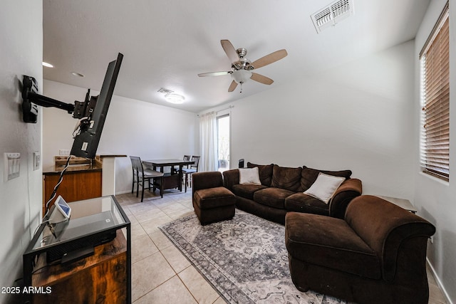 451 S Hawes Rd Unit 53, Mesa, AZ 85208 - living area featuring ceiling fan, light tile patterned floors, and baseboards