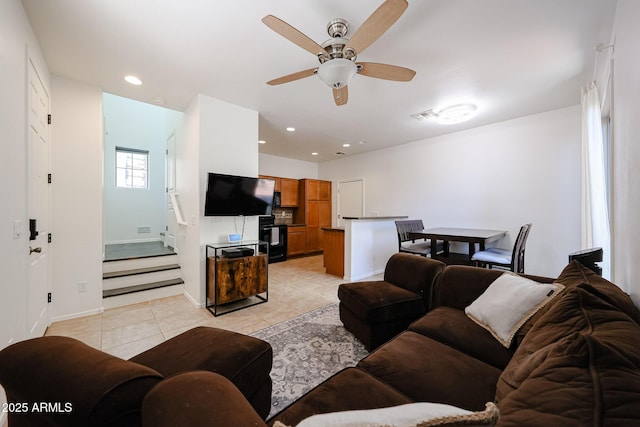 451 S Hawes Rd Unit 53, Mesa, AZ 85208 - living room featuring a ceiling fan, light tile patterned floors, stairs, recessed lighting, and baseboards