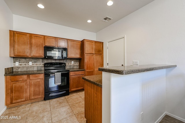 451 S Hawes Rd Unit 53, Mesa, AZ 85208 - kitchen featuring black appliances, brown cabinets, backsplash, and recessed lighting