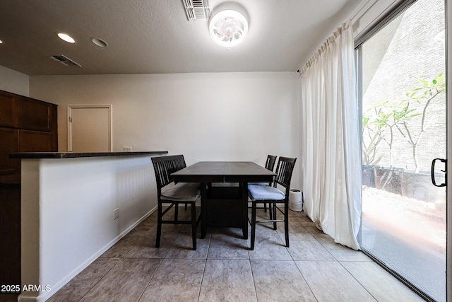 451 S Hawes Rd Unit 53, Mesa, AZ 85208 - dining area featuring recessed lighting and light tile patterned floors