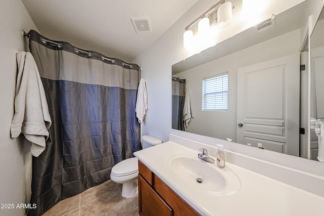 451 S Hawes Rd Unit 53, Mesa, AZ 85208 - bathroom featuring toilet, vanity, curtained shower, and tile patterned flooring