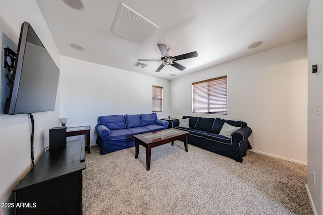 451 S Hawes Rd Unit 53, Mesa, AZ 85208 - carpeted living room with a ceiling fan and baseboards