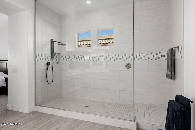 bathroom featuring tiled shower