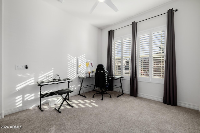 office with ceiling fan, plenty of natural light, and light colored carpet