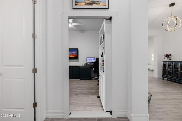 hallway featuring light wood-type flooring