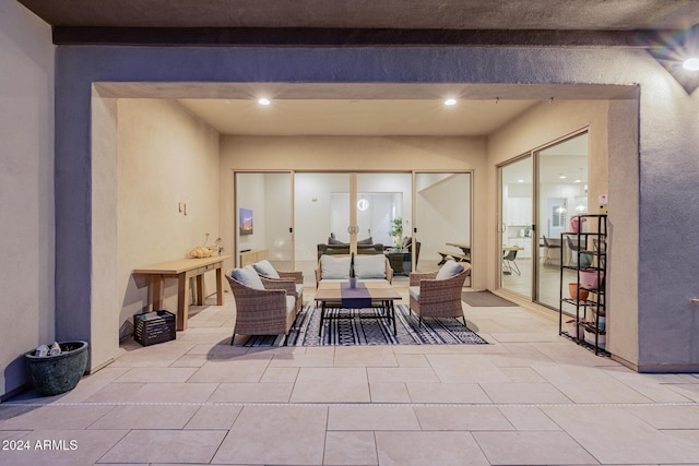 dining space featuring beamed ceiling