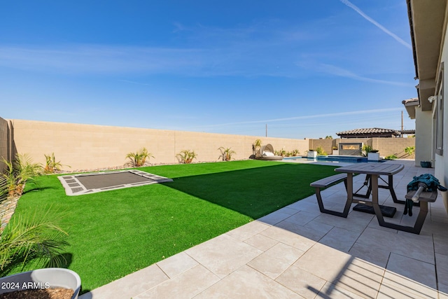 view of yard featuring a pergola and a patio