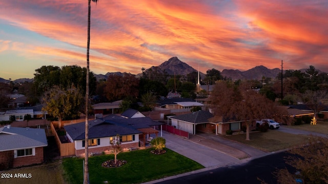 aerial view at dusk with a mountain view