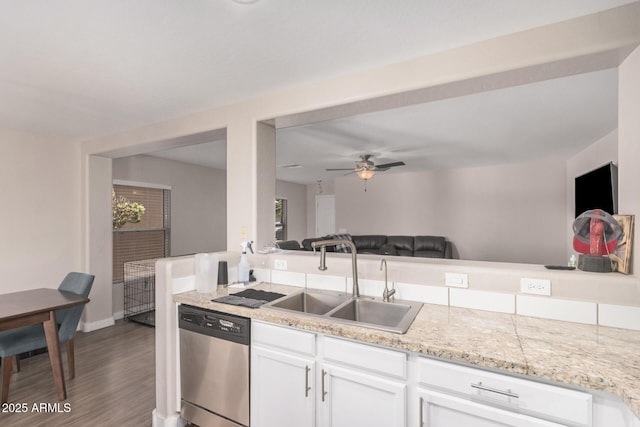 2516 E San Manuel Rd, San Tan Valley, AZ 85143 - kitchen with dishwasher, wood finished floors, white cabinetry, ceiling fan, and open floor plan