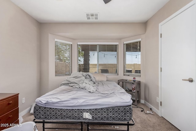 2516 E San Manuel Rd, San Tan Valley, AZ 85143 - bedroom with light colored carpet and multiple windows
