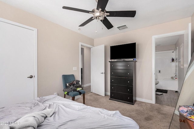 2516 E San Manuel Rd, San Tan Valley, AZ 85143 - carpeted bedroom with ceiling fan and ensuite bath