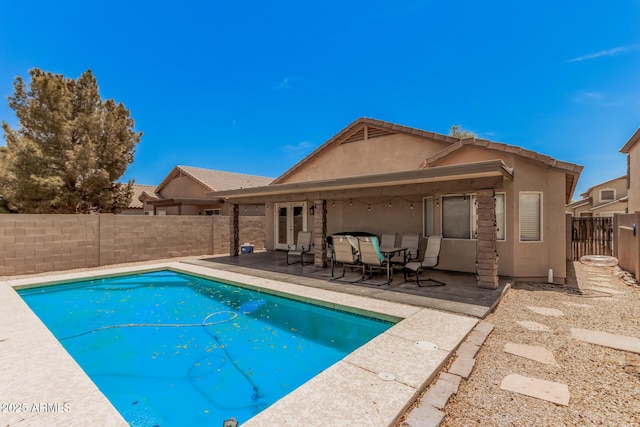 2516 E San Manuel Rd, San Tan Valley, AZ 85143 - view of swimming pool with a fenced backyard, a patio, and french doors