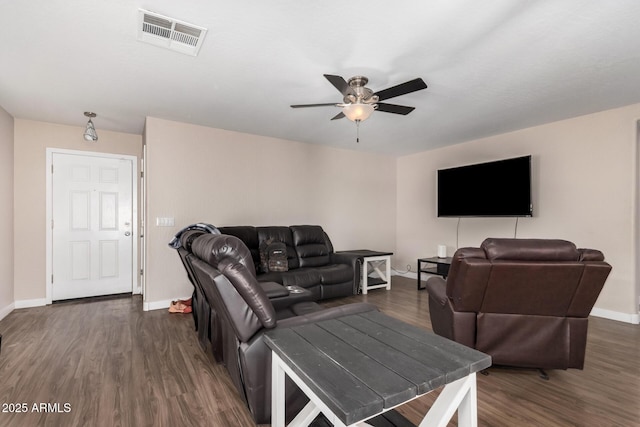 2516 E San Manuel Rd, San Tan Valley, AZ 85143 - living area with ceiling fan and dark wood-type flooring
