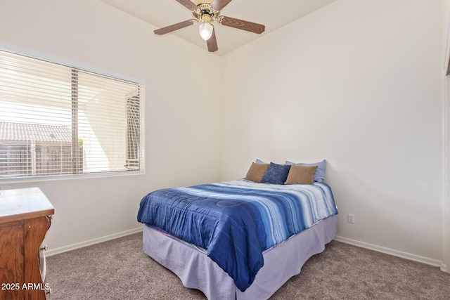 bedroom featuring ceiling fan, carpet flooring, and baseboards