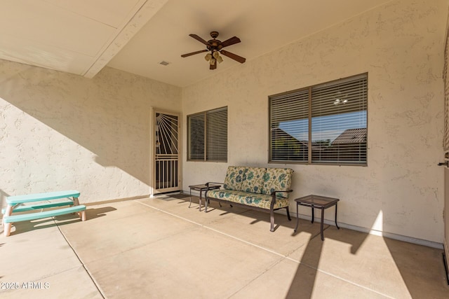 view of patio with a ceiling fan