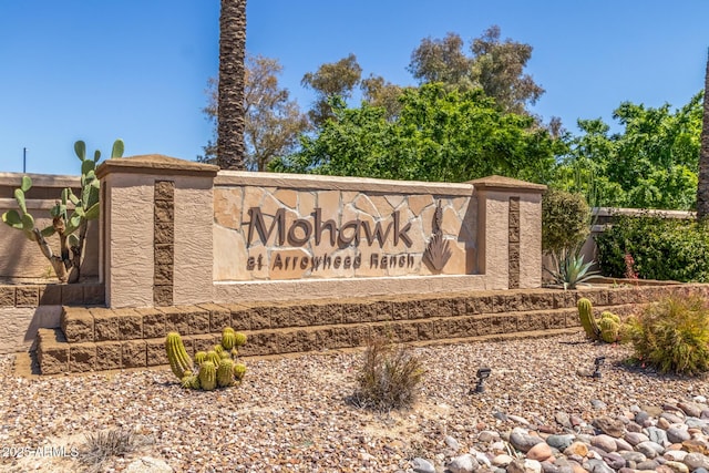 view of community sign