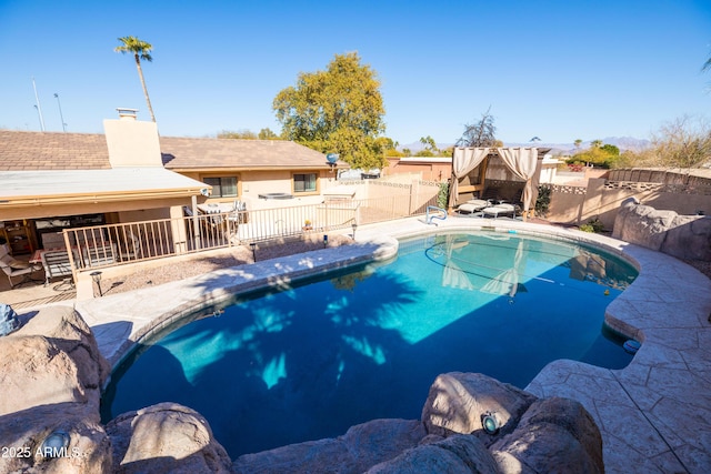 view of pool featuring a patio