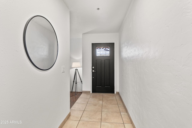 view of tiled foyer entrance