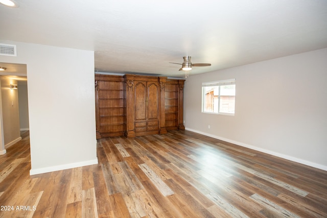 unfurnished bedroom featuring ceiling fan and light hardwood / wood-style floors