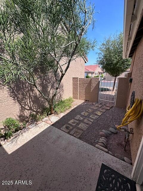 3510 E Hampton Ave Unit 133, Mesa, AZ 85204 - view of patio featuring a gate