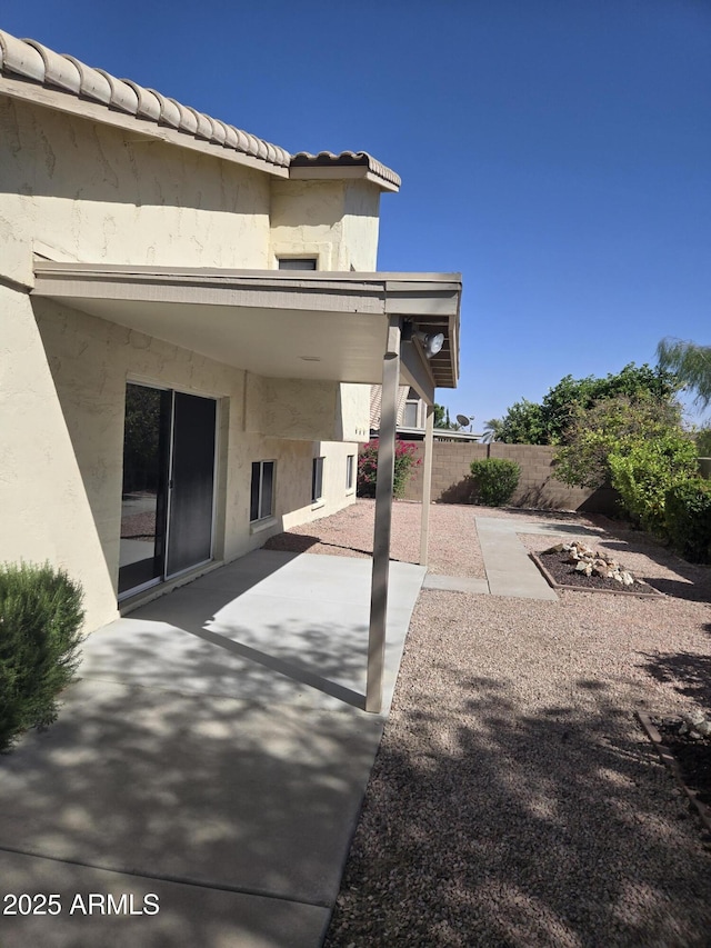 view of patio / terrace with fence